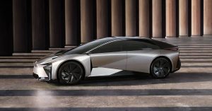The Lexus LF-ZC is shown from a side angle, featuring sleek lines and large wheels.