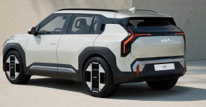 Rear angle view of Kia EV3, featuring distinctive taillights and unique wheel design.
