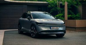 The Zeekr 7X is shown from a front angle, featuring sleek lines, alloy wheels, and a modern design.