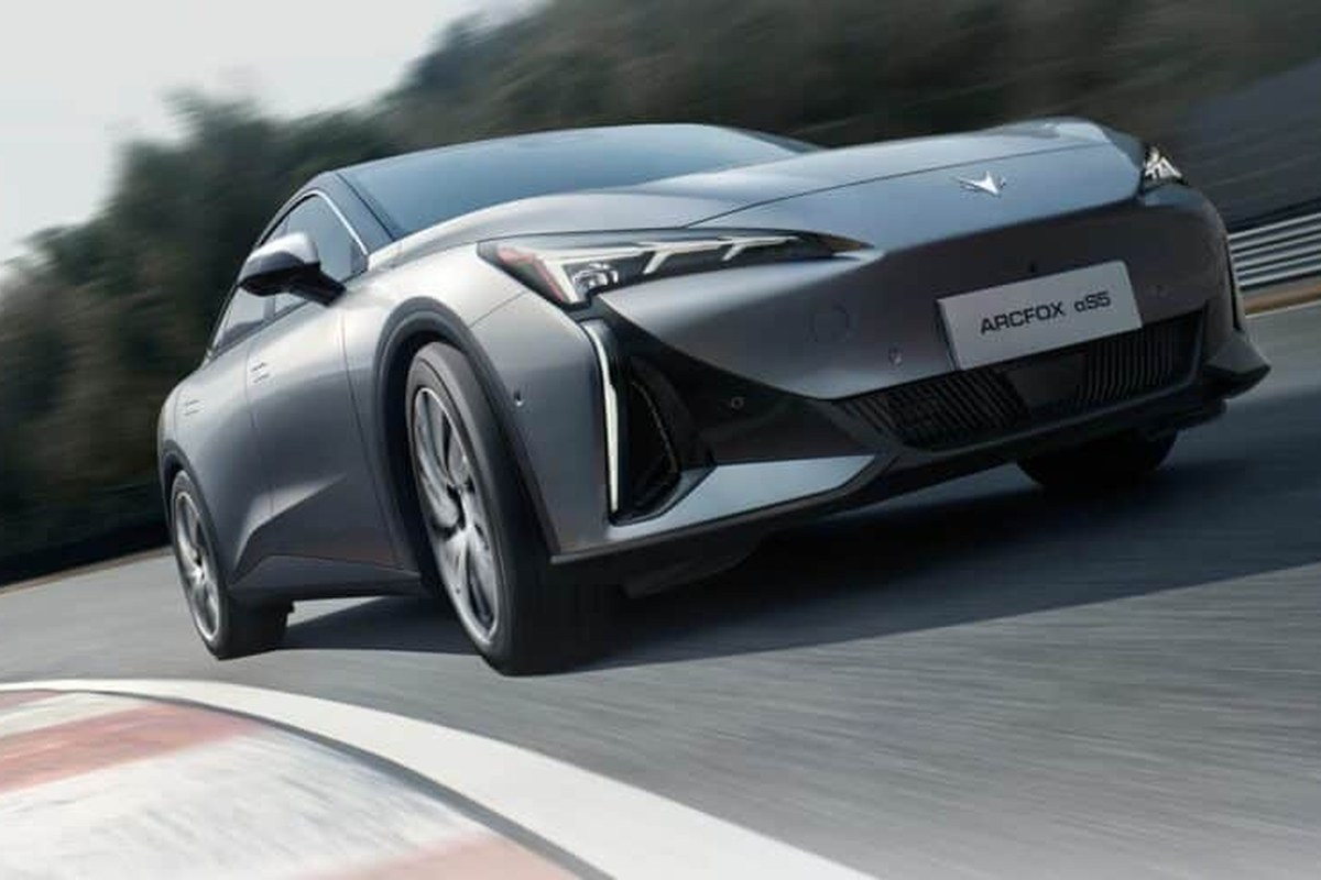The Arcfox Alpha S5 is shown from a front angle, featuring sleek headlights and aerodynamic design.